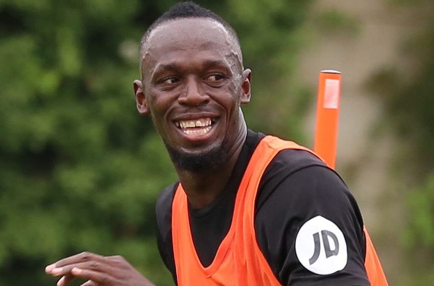  Usain Bolt asks Lauren Hemp for shirt after watching Man City beat Chelsea