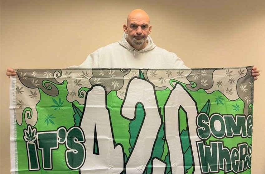  Sen. Fetterman tweets image holding 420 flag to acknowledge cannabis holiday