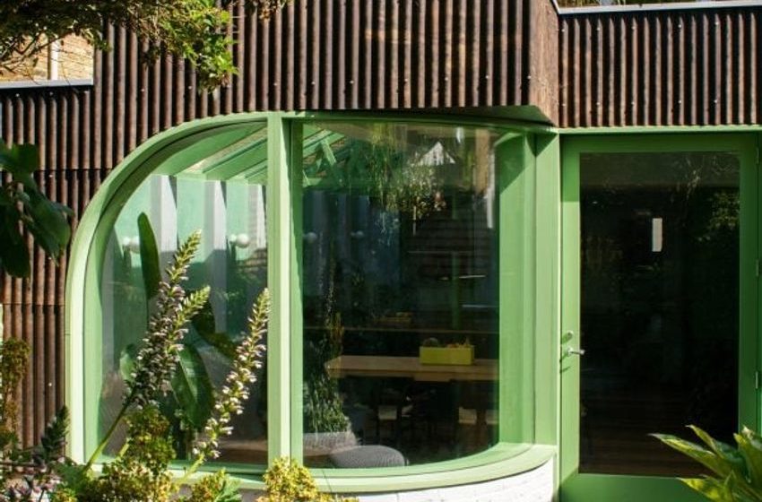  CAN relinks Verdant House with garden using statement green window